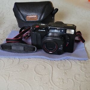 Canon Vintage Black Film Camera with Red Accents